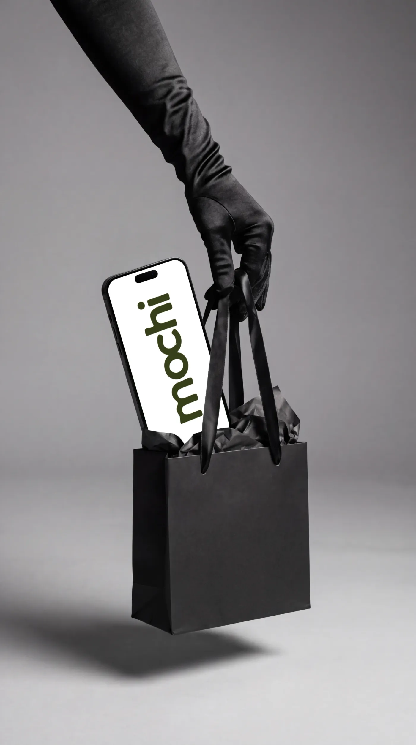 Phone mockup held in hand, studio scene — Satin Glove Gift Bag Handheld